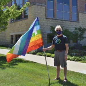 C3 Member Andy Cawthon with Pride Flag